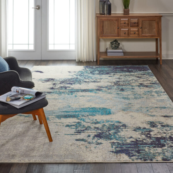 7' X 10' Ivory Abstract Power Loom Area Rug
